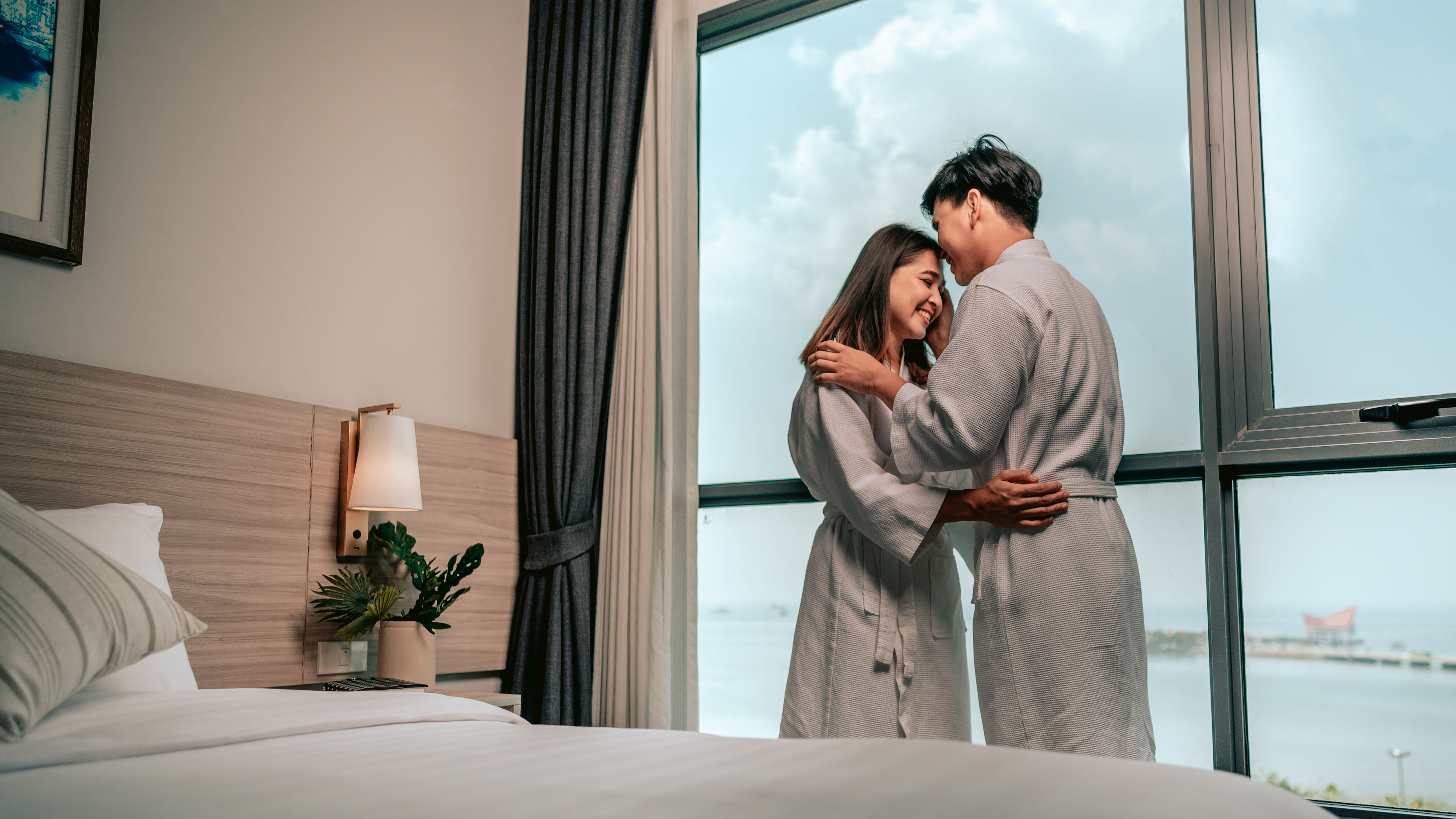 A couple is standing close together