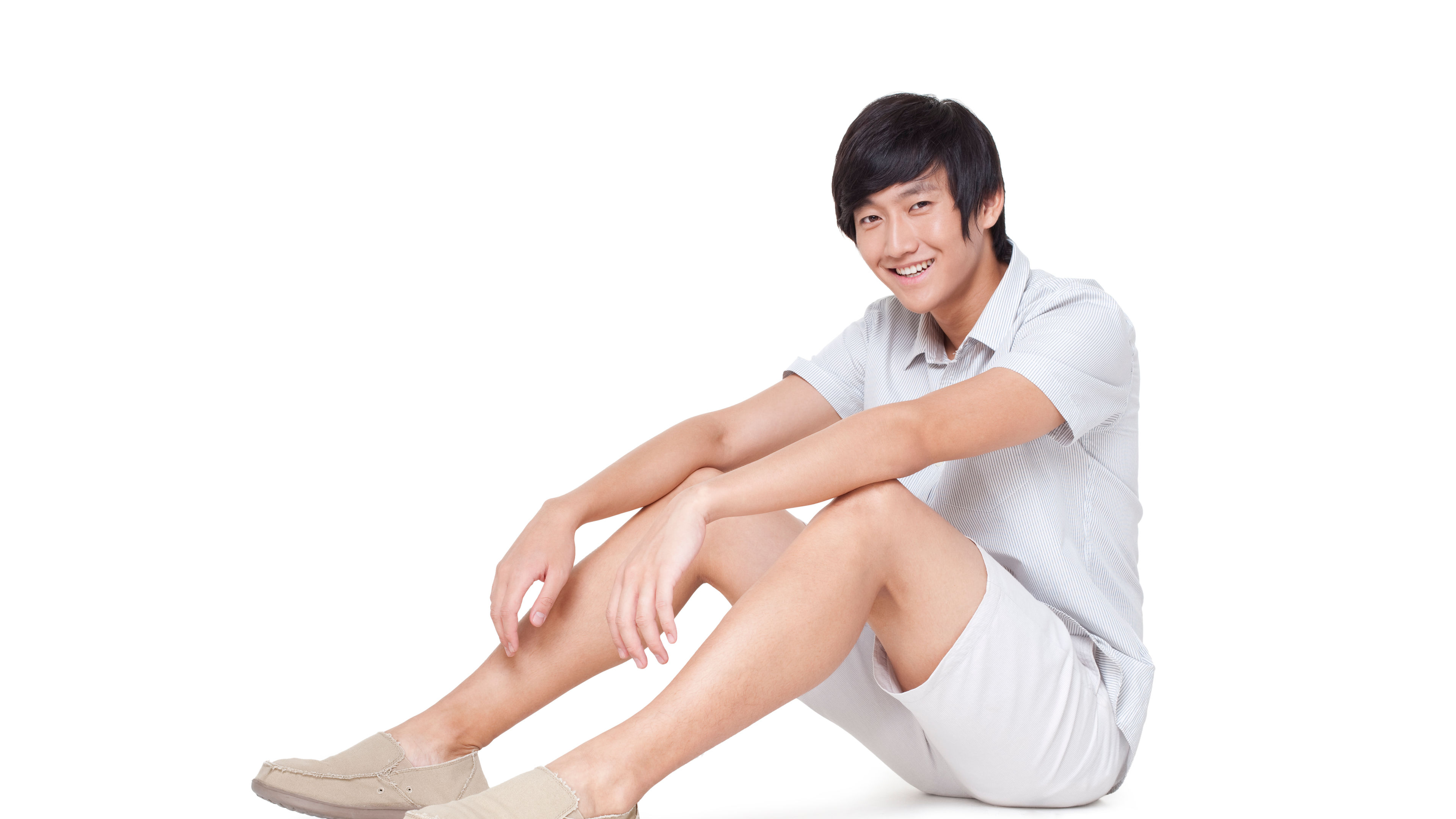 A man looking at the camera and smiling