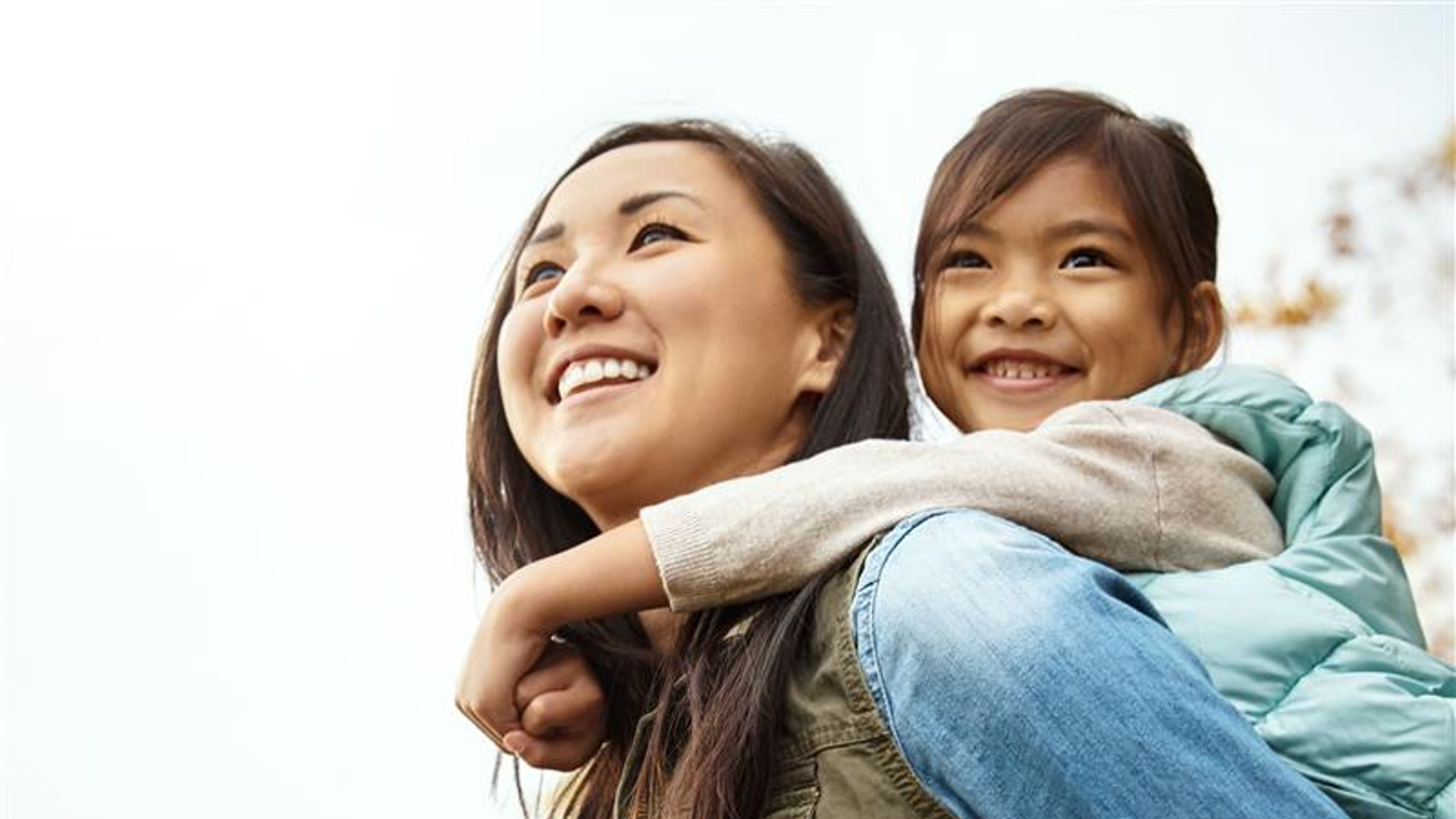 A mother and a daughter travelling.