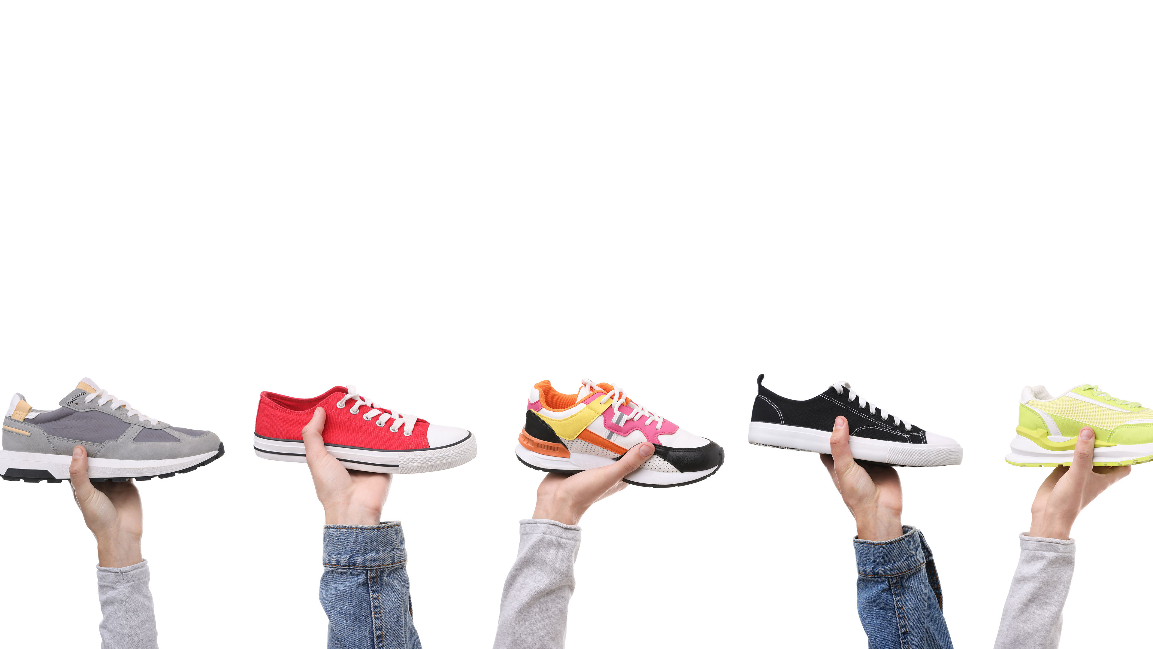 Colorful Sneakers Presented by Hands
