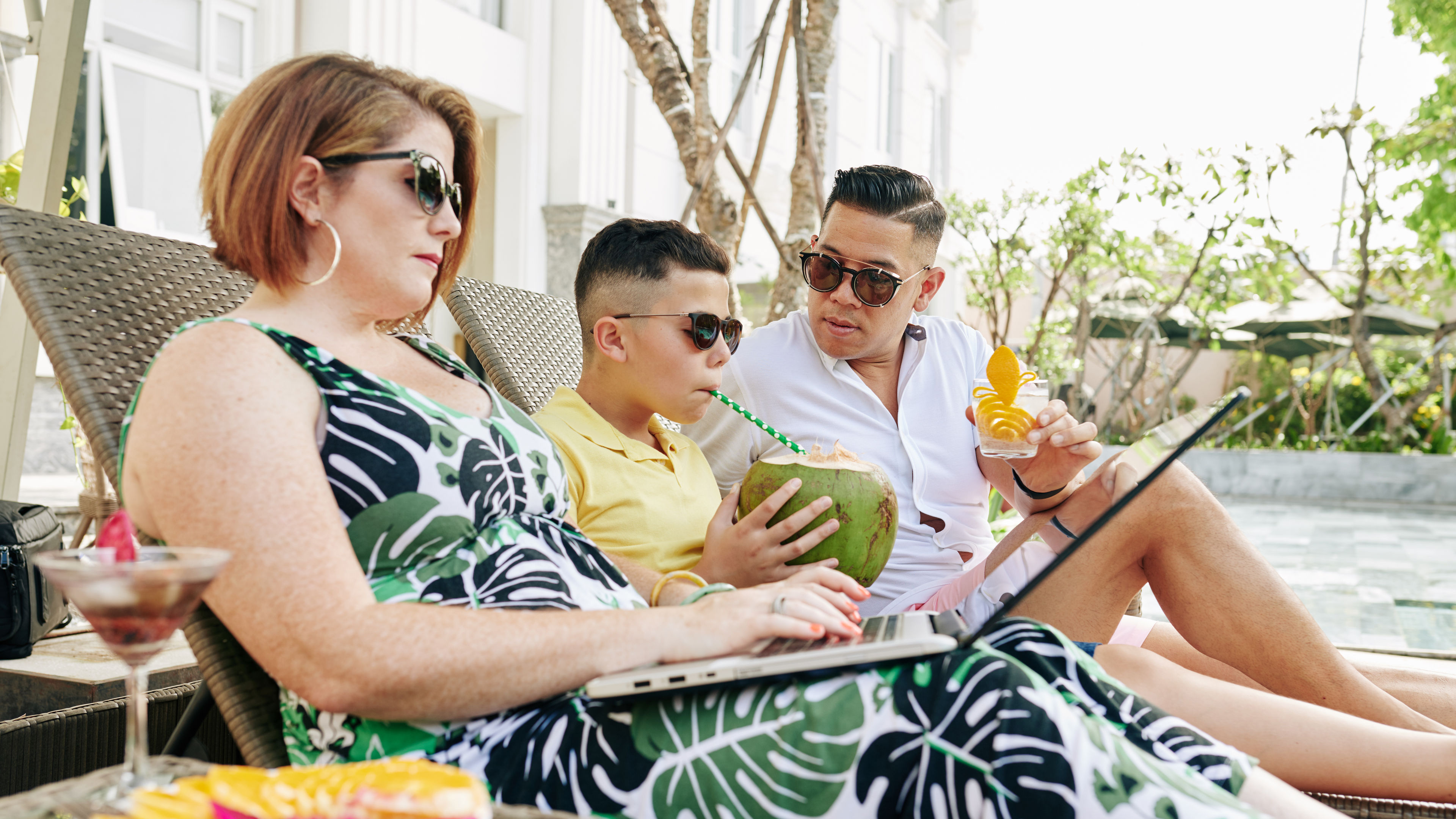 Family Relaxing by the Pool 