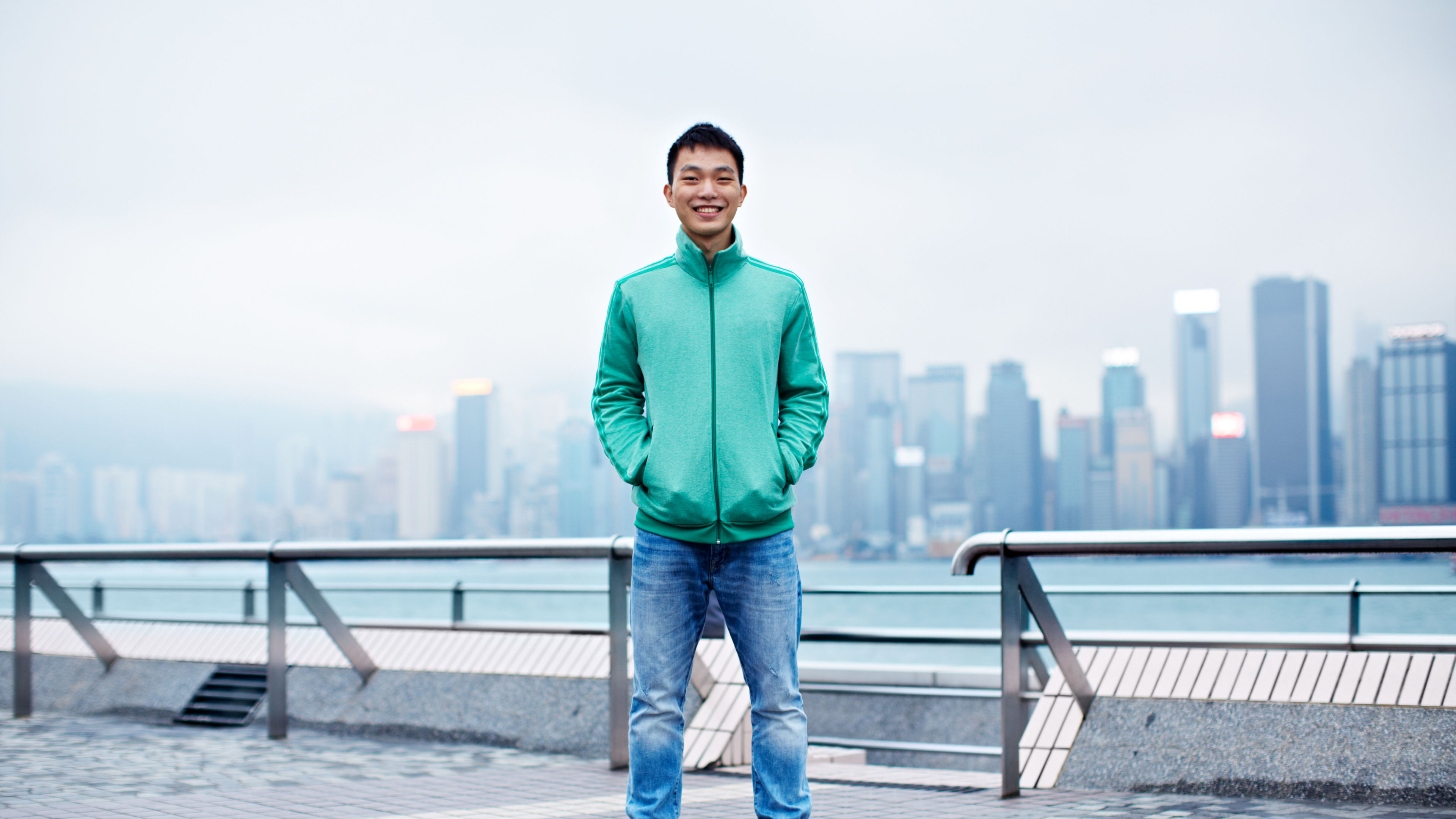 Young Man in Teal Jacket